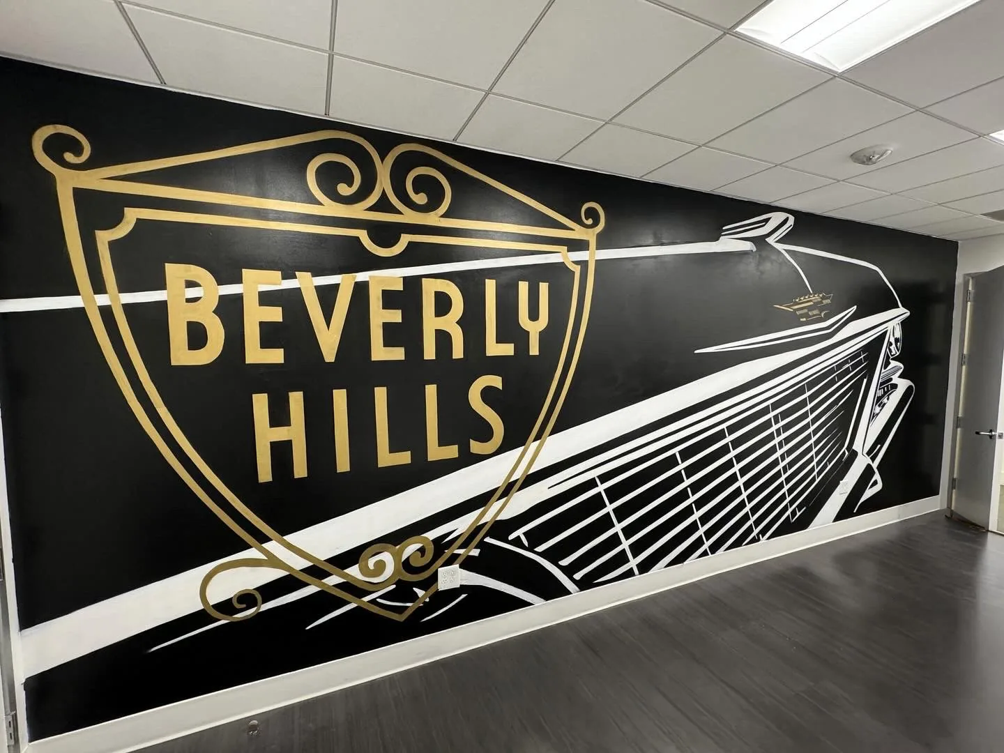 Beverly Hills Cadillac mural black and gold